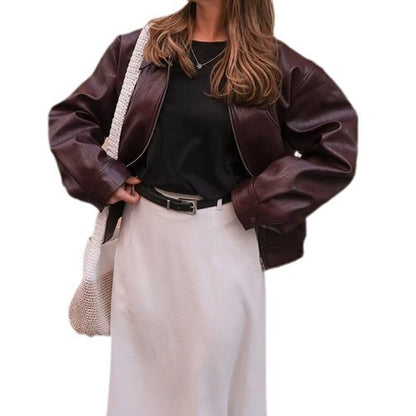 Manteau ample à manches longues et revers en cuir avec fermeture éclair